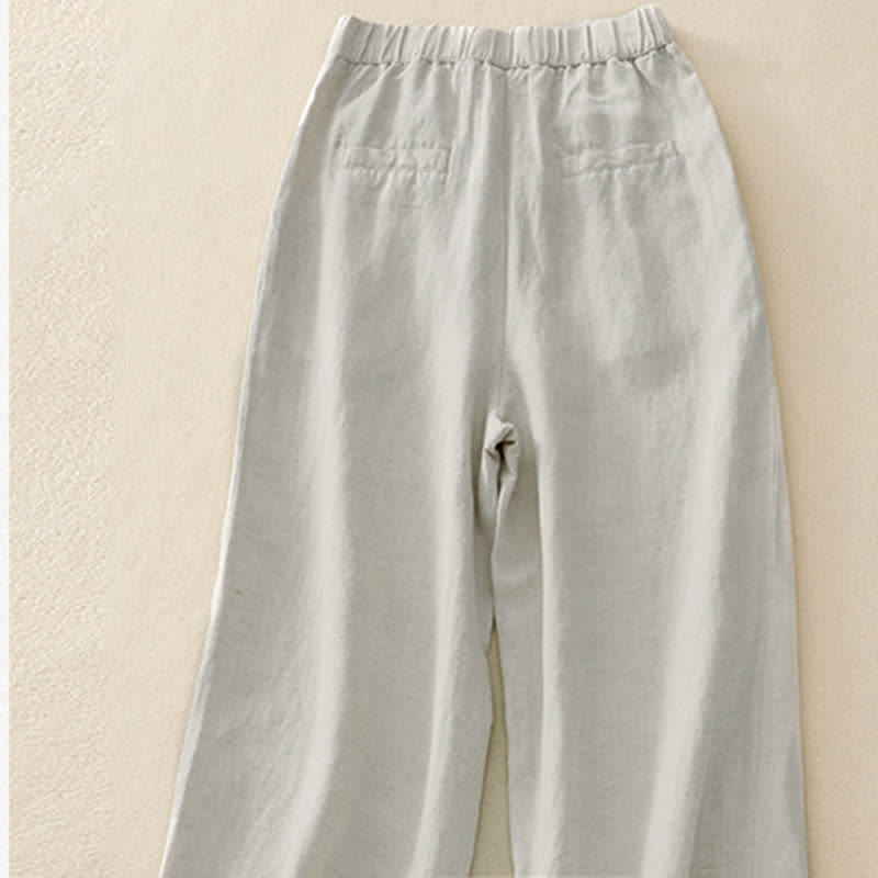 Pantalones de mujer con Buddha Stones, color liso, cierre frontal, cintura elástica y bolsillos. - image 1