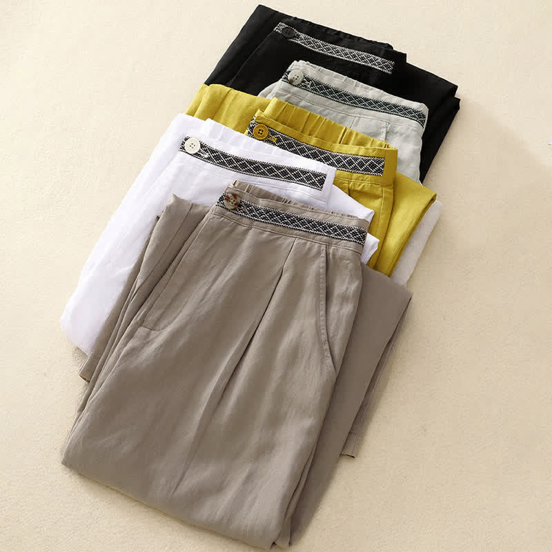 Pantalones de mujer con Buddha Stones, color liso, cierre frontal, cintura elástica y bolsillos. - image 1
