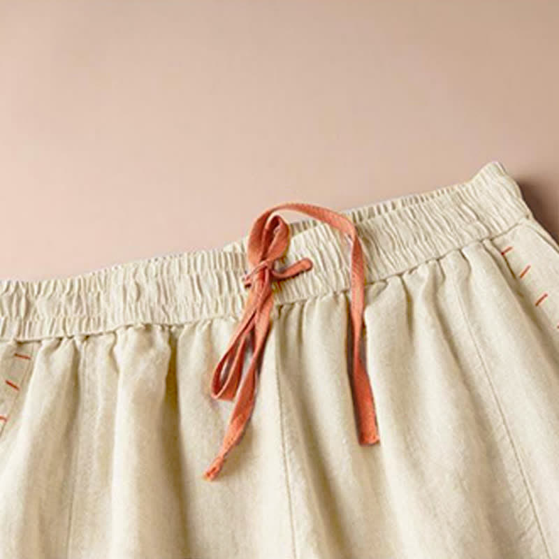 Pantalones de mujer de pierna ancha con bolsillos, estilo casual, con abertura en el bajo y estampado de Buddha Stones. - image 1