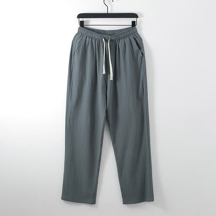 Pantalones casuales holgados de algodón y lino de color liso con estampado de Buddha Stones para hombre, con bolsillos. - Gris oscuro - US/UK/AU54, EU64 (9XL) - image 0