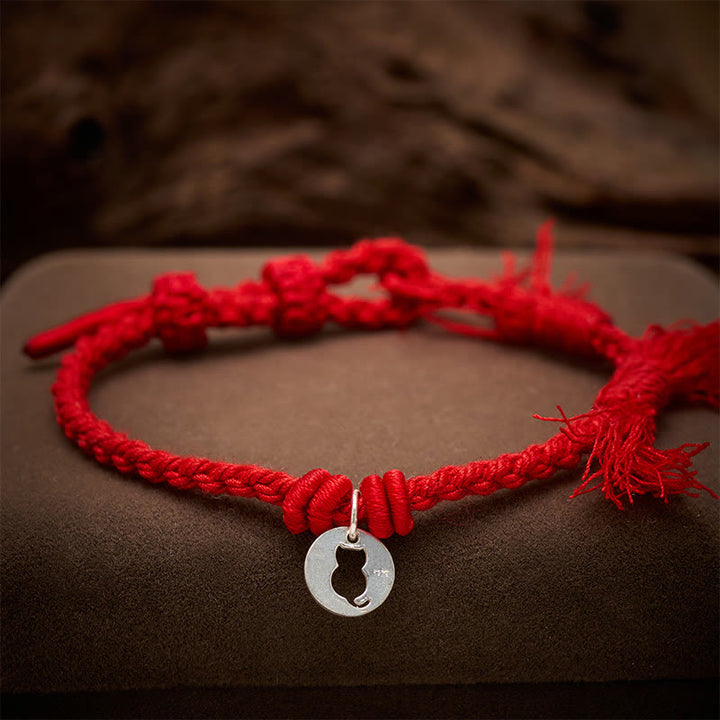 Buddha Stones Pulsera con dije de plata de ley 925 con diseño redondo hueco y cordón rojo de gato protector. - image 3