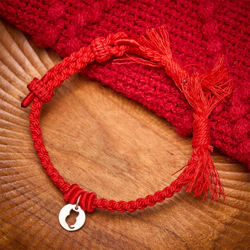 Buddha Stones Pulsera con dije de plata de ley 925 con diseño redondo hueco y cordón rojo de gato protector. - Rojo (circunferencia de la muñeca: 14-17 cm) - image 0