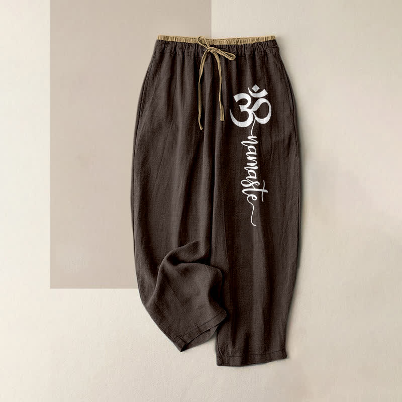 Buddha Stones Pantalones de mujer de algodón puro con estampado del símbolo Om, cintura elástica y bolsillos. - Marrón silla de montar - US16，UK/AU20，EU48 (3XL) - image 0