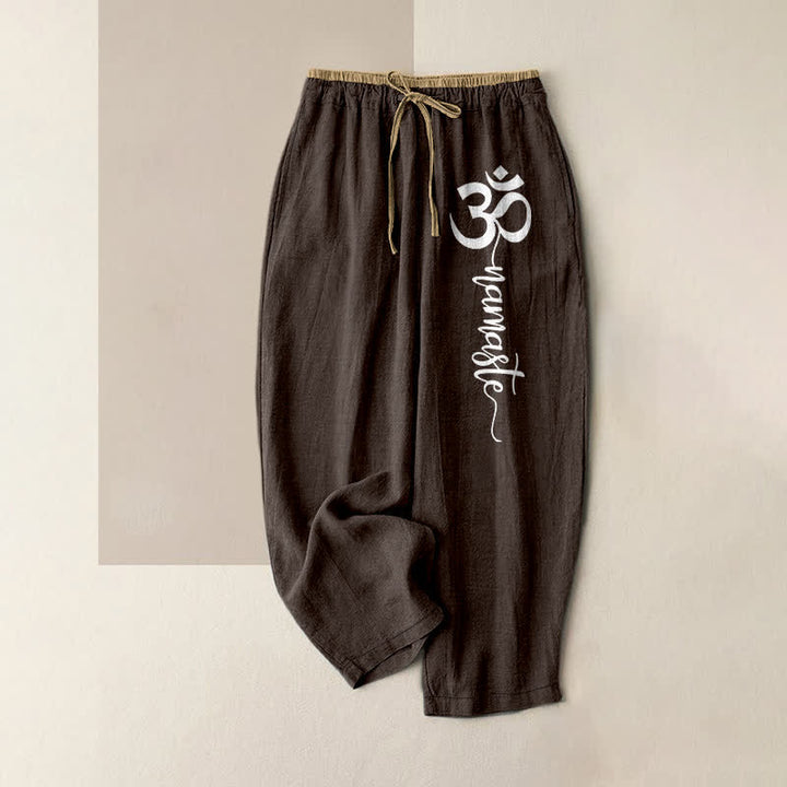 Buddha Stones Pantalones de mujer de algodón puro con estampado del símbolo Om, cintura elástica y bolsillos. - Marrón silla de montar - US16，UK/AU20，EU48 (3XL) - image 0