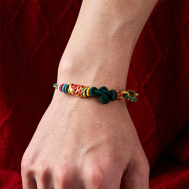 Buddha Stones Pulsera de protección tejida a mano con hilo verde oscuro y amarillo y diseño de pez koi rojo. - image 4