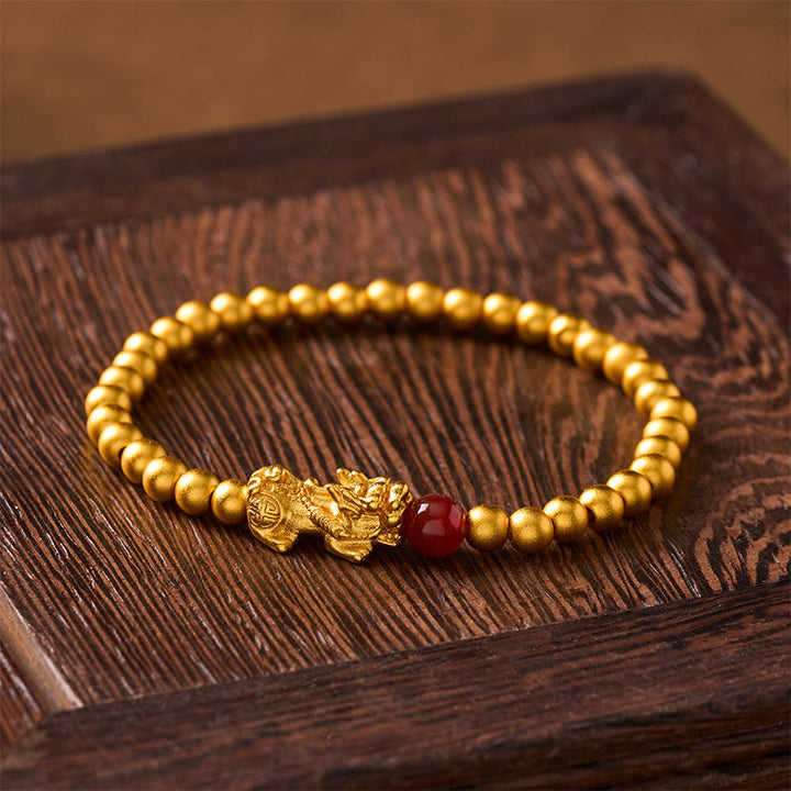 Buddha Stones Pulsera de cuentas redondas de ágata roja Pi Xiu chapada en oro y cobre - image 1