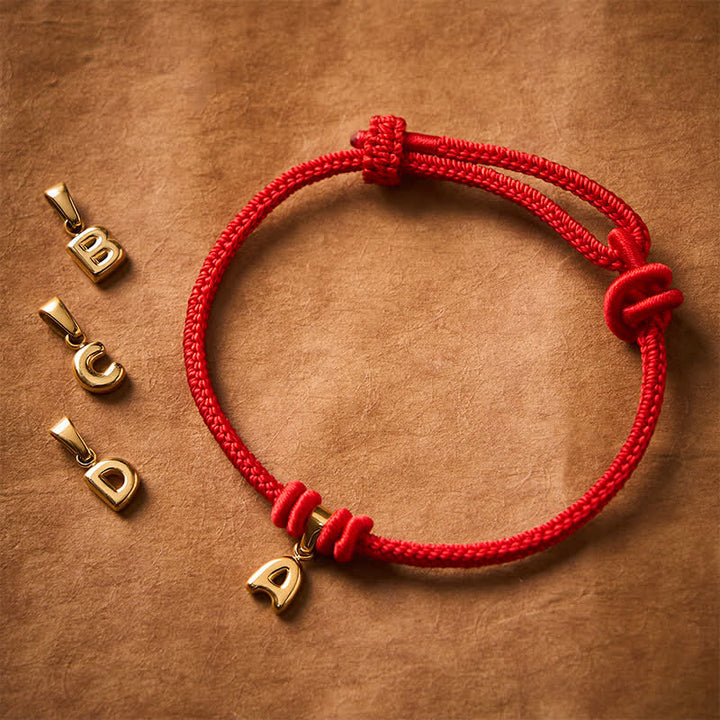 Buddha Stones Pulsera Faith de acero de titanio con letra roja - image 26