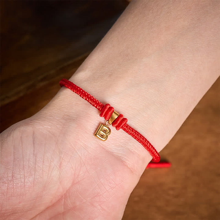 Buddha Stones Pulsera Faith de acero de titanio con letra roja - image 14