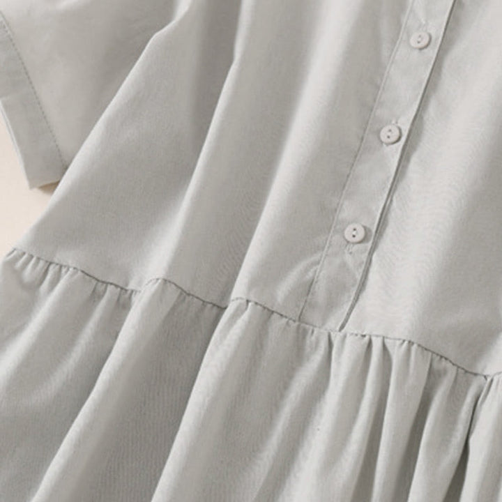 Vestido midi de manga corta con bolsillos, diseño de botones y estampado de Buddha Stones para el verano. - image 10