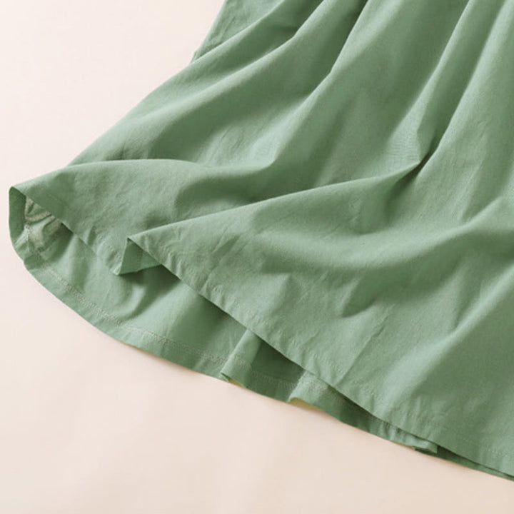 Vestido midi de manga corta con bolsillos, diseño de botones y estampado de Buddha Stones para el verano. - image 25