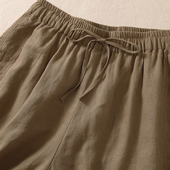 Pantalones cortos de mujer con cordón ajustable, bolsillos y estampado floral informal de Buddha Stones. - image 8