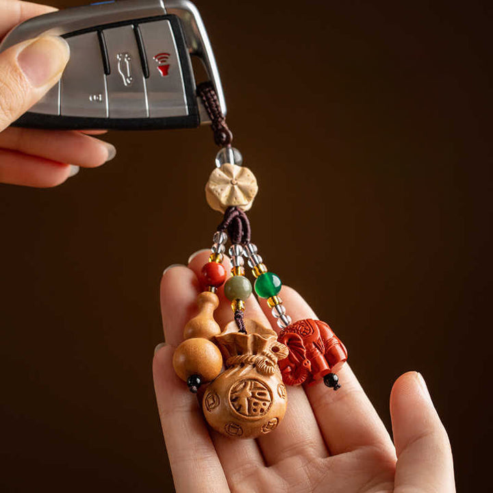 Buddha Stones Llaveros de calabaza de loto con forma de bolsa de dinero con personajes de madera de durazno Fu - image 4