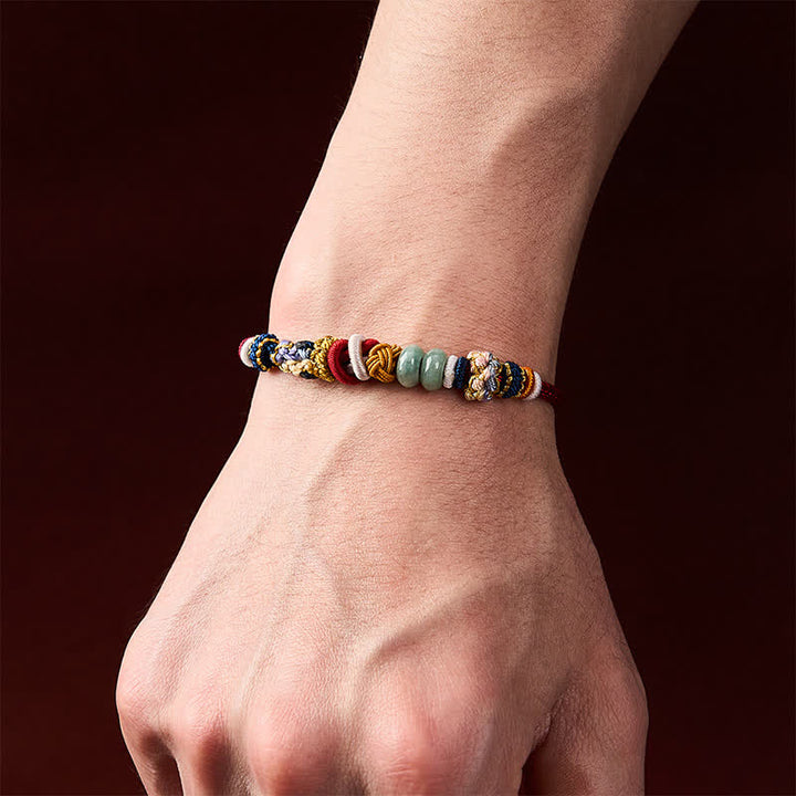 Buddha Stones Pulsera de hilo rojo y azul marino con cuentas de jade y flor de durazno tejida a mano - image 5