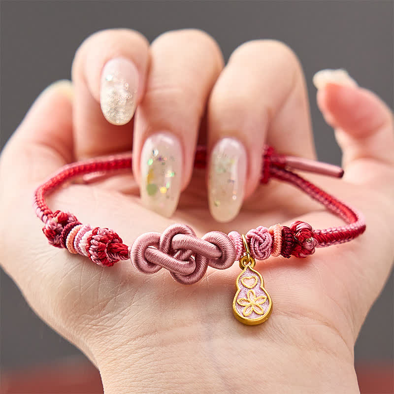 Buddha Stones Pulsera de hilo rosa con la frase "Hazte rico rápidamente" tejida a mano con la frase "Refuerza tu calabaza" - Rosa con accesorio de calabaza - image 0