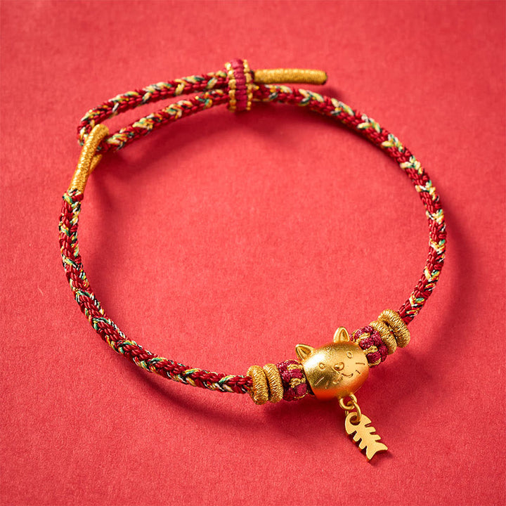 Buddha Stones Pulsera de equilibrio de hilo con forma de pez gato de cobre multicolor - image 1