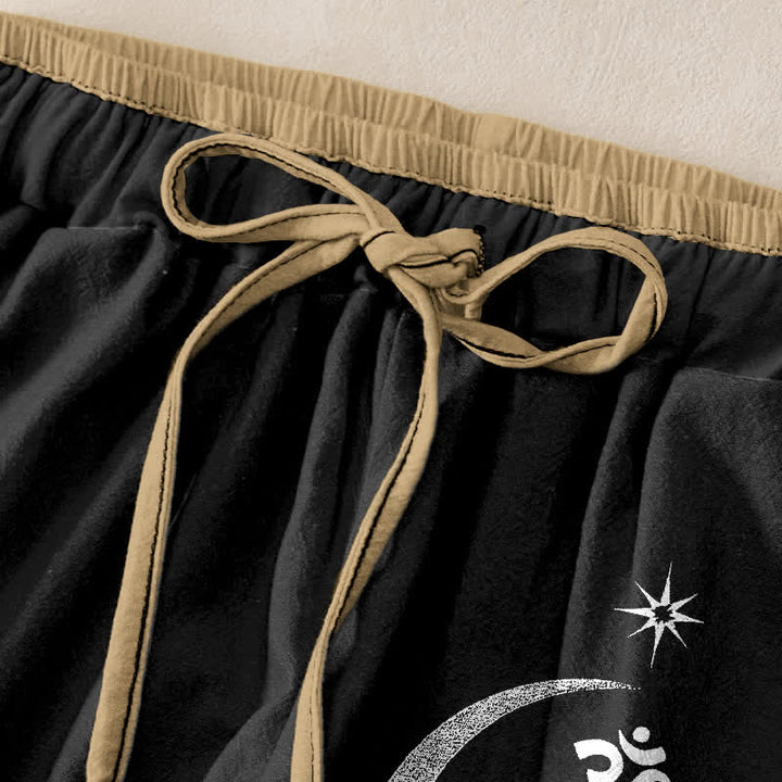 Buddha Stones Pantalones de mujer de algodón puro con estampado de loto, luna y símbolo Om, cintura elástica y bolsillos. - image 1