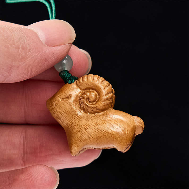Buddha Stones Llaveros con forma de cabra tallados a mano en madera de sándalo - image 12