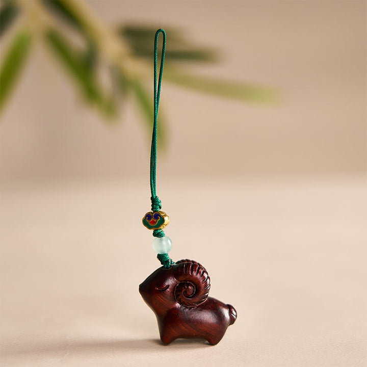 Buddha Stones Llaveros con forma de cabra tallados a mano en madera de sándalo - Rojo oscuro - image 14