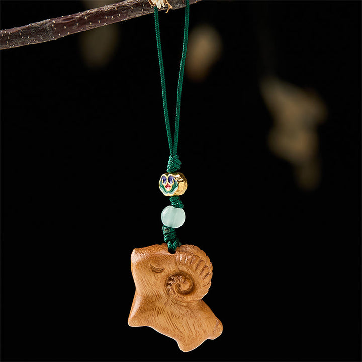 Buddha Stones Llaveros con forma de cabra tallados a mano en madera de sándalo - image 9