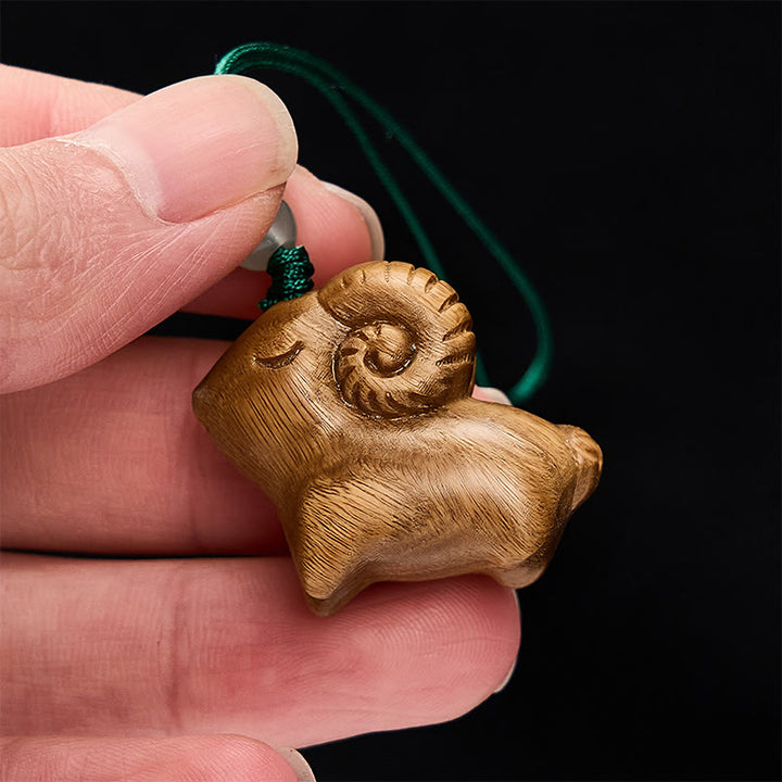 Buddha Stones Llaveros con forma de cabra tallados a mano en madera de sándalo - image 4