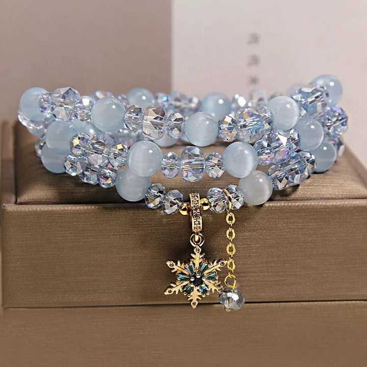 Buddha Stones Pulsera con dije de bendición de copo de nieve azul ojo de gato de triple vuelta - Ojo de gato azul (Intuición ♥ Claridad) - image 0