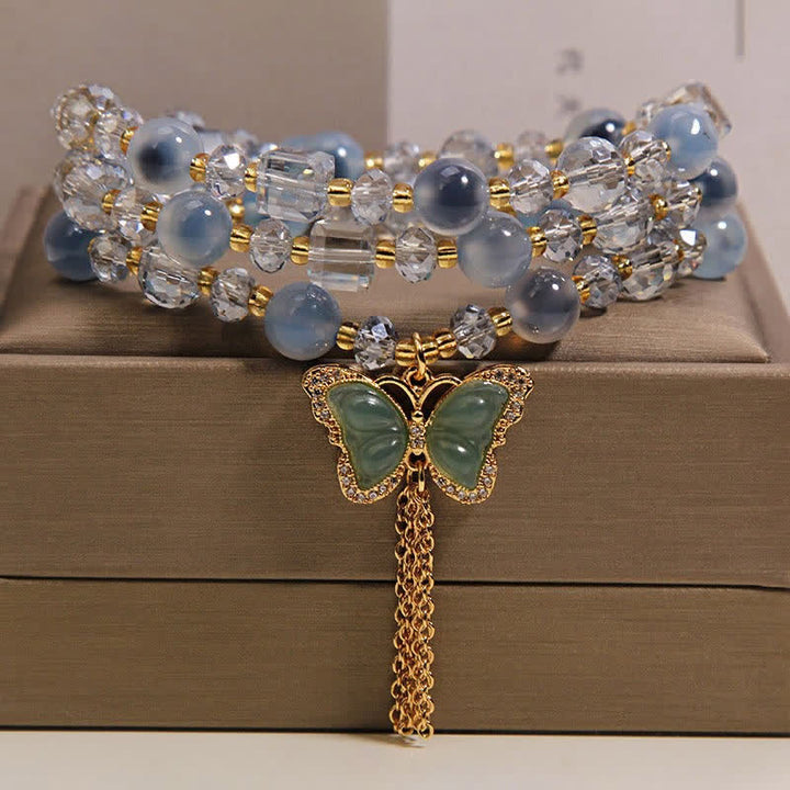 Buddha Stones Pulsera de capas de ágata azul caramelo con mariposa y confianza - Ágata de caramelo (Esperanza ♥ Equilibrio) - image 0