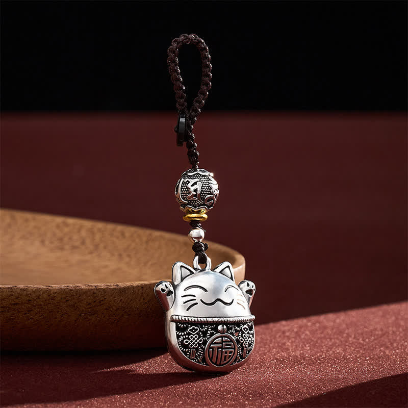 Buddha Stones Llaveros trenzados de cobre grabados con el personaje Fu y el gato de la suerte. - image 1