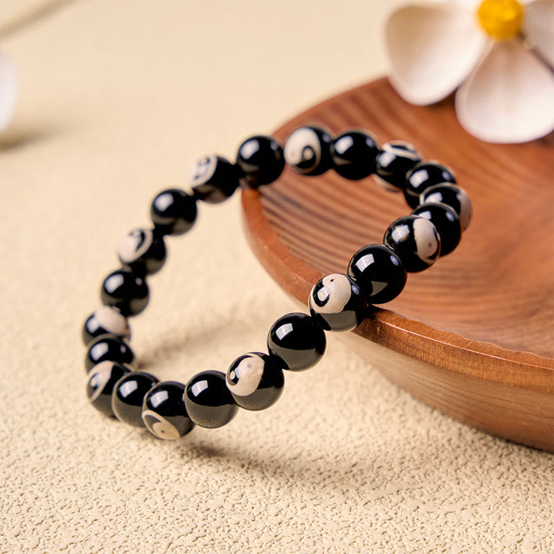 Buddha Stones Pulsera de equilibrio con cuentas Yin Yang de ónix negro - image 1