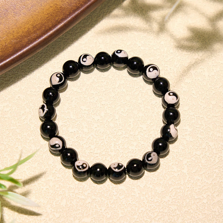 Buddha Stones Pulsera de equilibrio con cuentas Yin Yang de ónix negro - image 2