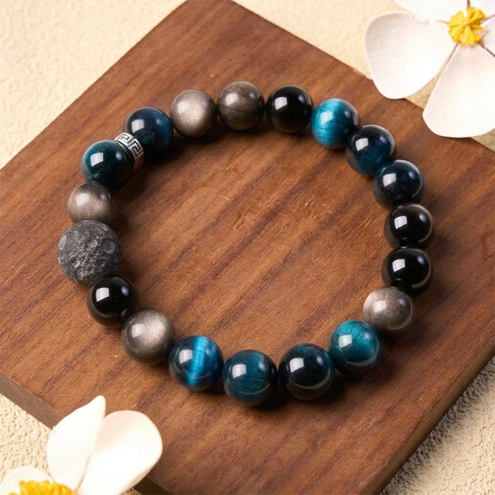 Buddha Stones Pulsera de pareja con brillo plateado y efecto positivo de obsidiana ojo de tigre azul - image 1