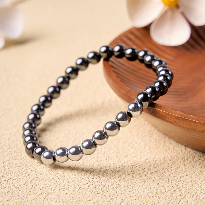 Buddha Stones Pulsera redonda de cuentas de hematita para conexión a tierra - image 1