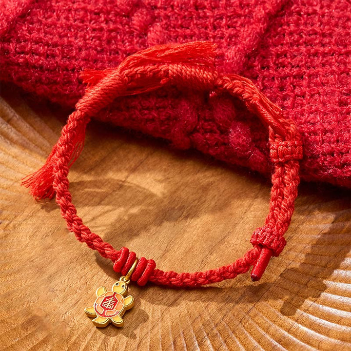Buddha Stones Pulsera tibetana con dije de tortuga, chapada en oro y de cobre con cordón rojo. - Rojo (Circunferencia de la muñeca: 5,5–6,7 pulgadas/14–17 cm) - image 0