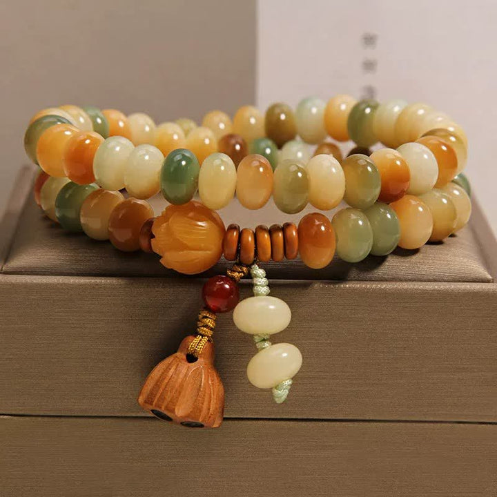 Buddha Stones Pulsera de doble vuelta con diseño de loto blanco Bodhi Seed Pureza - Doble envoltura (circunferencia de la muñeca: 5,5–5,9 pulgadas (14–15 cm)) - image 0