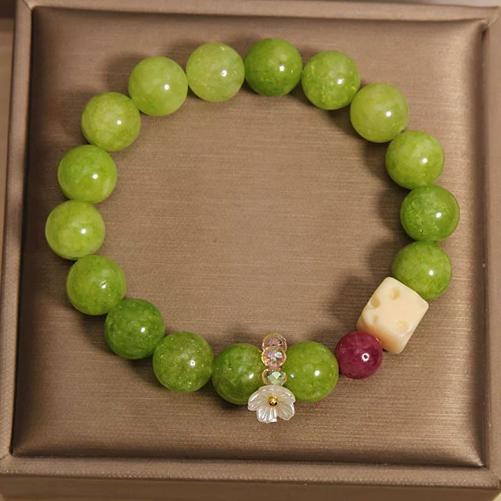 Buddha Stones Pulsera de cuentas con dije de flor de peridoto para sanación - image 2