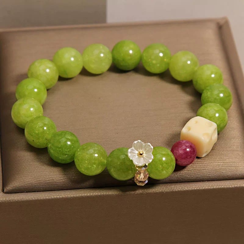Buddha Stones Pulsera de cuentas con dije de flor de peridoto para sanación - image 1