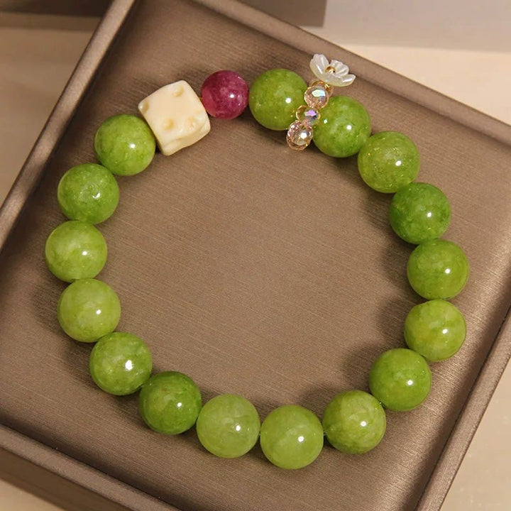 Buddha Stones Pulsera de cuentas con dije de flor de peridoto para sanación - image 3