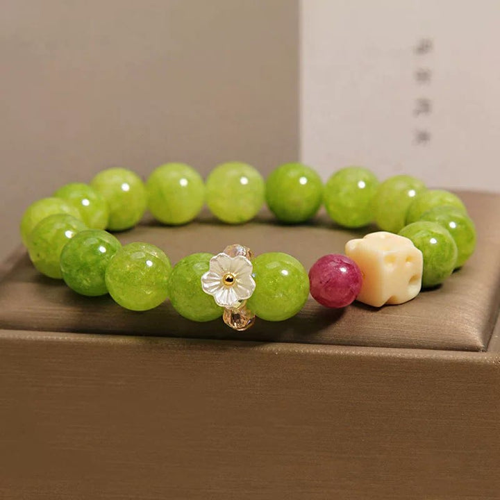 Buddha Stones Pulsera de cuentas con dije de flor de peridoto para sanación - image 8