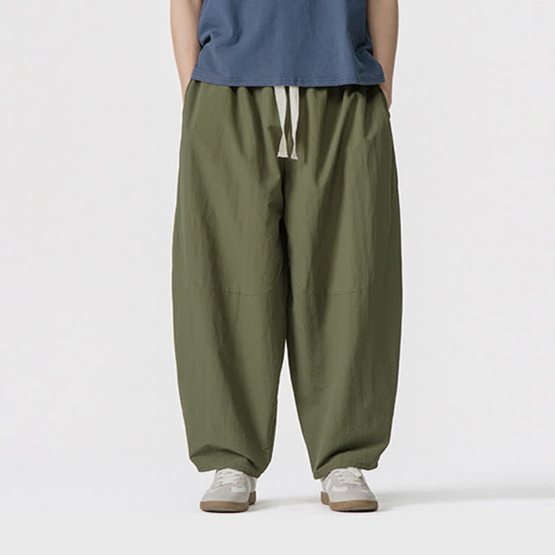 Buddha Stones Pantalones cortos minimalistas informales de primavera/verano con cordón ajustable, color liso, estilo harem para hombre con bolsillos. - image 1