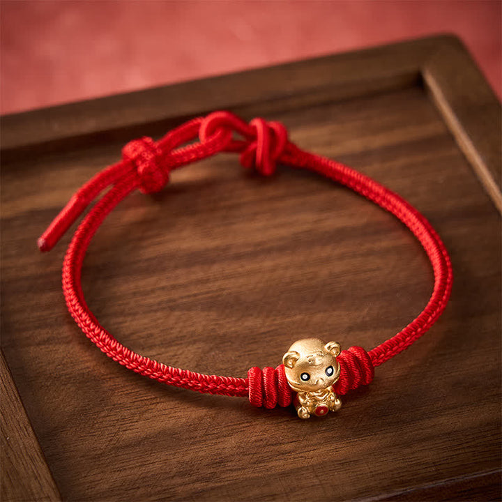 Buddha Stones Pulsera de cuerda trenzada con diseño de bolsa de dinero de tigre y cordón rojo - image 1