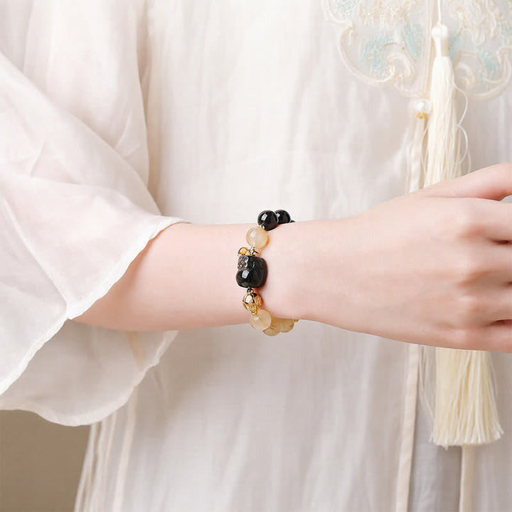 Buddha Stones Pulsera de cuentas de cuarzo rutilado dorado Pi Xiu de Feng Shui con ojo de tigre para la riqueza - image 11
