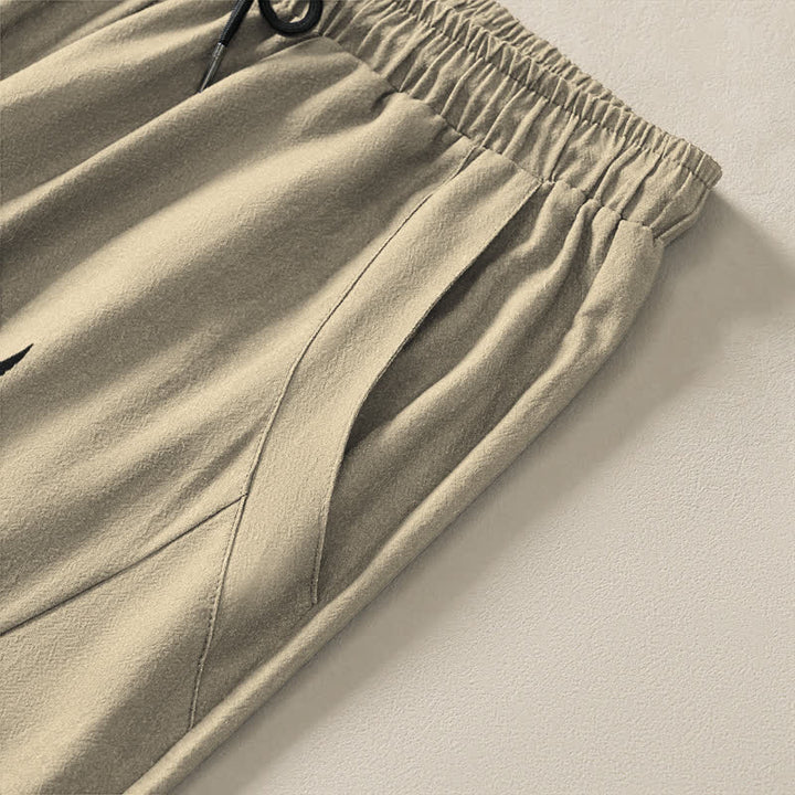 Buddha Stones Pantalones de hombre de algodón puro con estampado tribal de sol, cordón ajustable y corte cónico, con bolsillos. - image 4