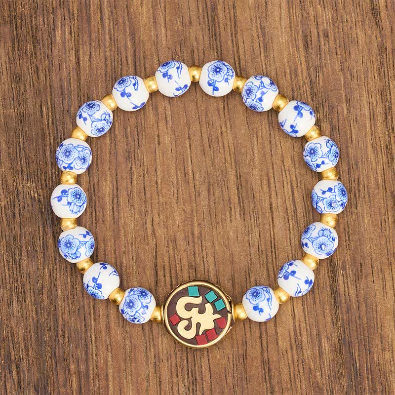 Buddha Stones Pulsera de cuentas de compasión OM de cobre y porcelana azul y blanca - image 2