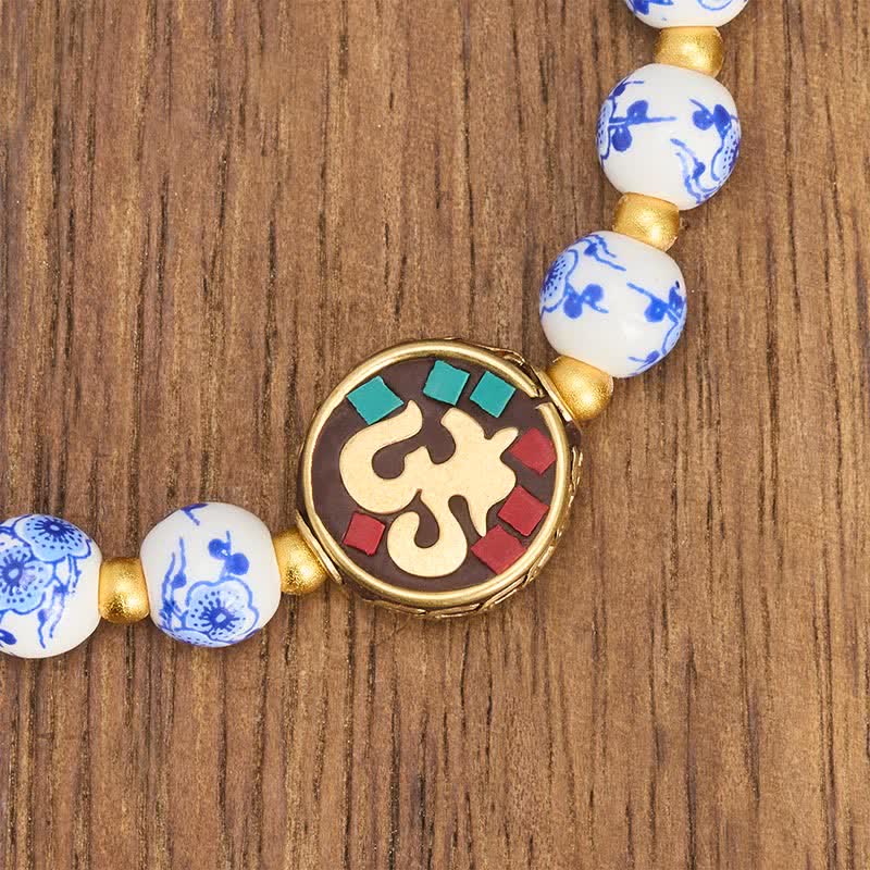 Buddha Stones Pulsera de cuentas de compasión OM de cobre y porcelana azul y blanca - image 4