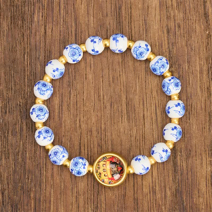 Buddha Stones Pulsera de cuentas de riqueza Zakiram de porcelana azul y blanca - image 1