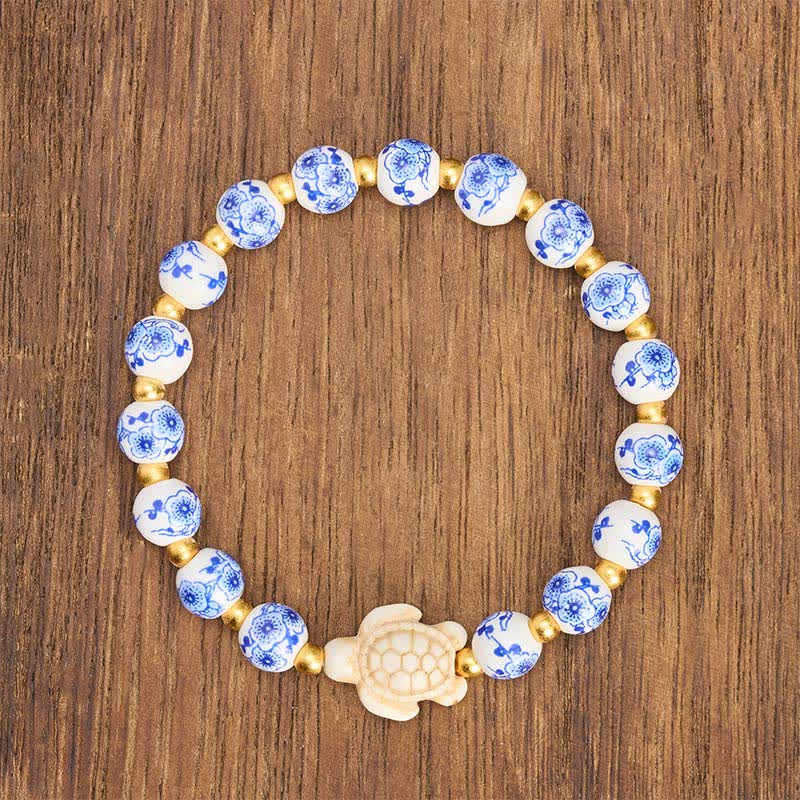 Buddha Stones Pulsera de porcelana azul y blanca con forma de tortuga, símbolo de pureza y longevidad. - image 1