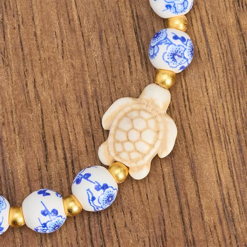 Buddha Stones Pulsera de porcelana azul y blanca con forma de tortuga, símbolo de pureza y longevidad. - image 9