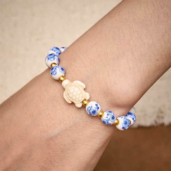Buddha Stones Pulsera de porcelana azul y blanca con forma de tortuga, símbolo de pureza y longevidad. - image 4