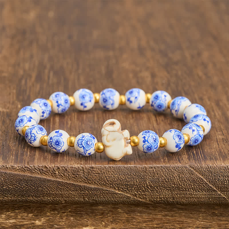 Buddha Stones Pulsera redonda de cuentas florales con forma de elefante de porcelana blanca - image 2