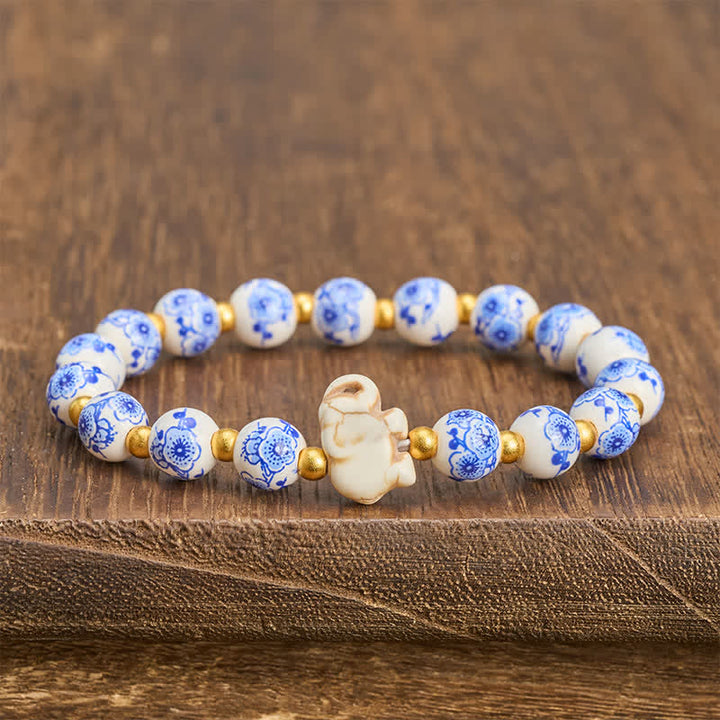 Buddha Stones Pulsera redonda de cuentas florales con forma de elefante de porcelana blanca - image 2