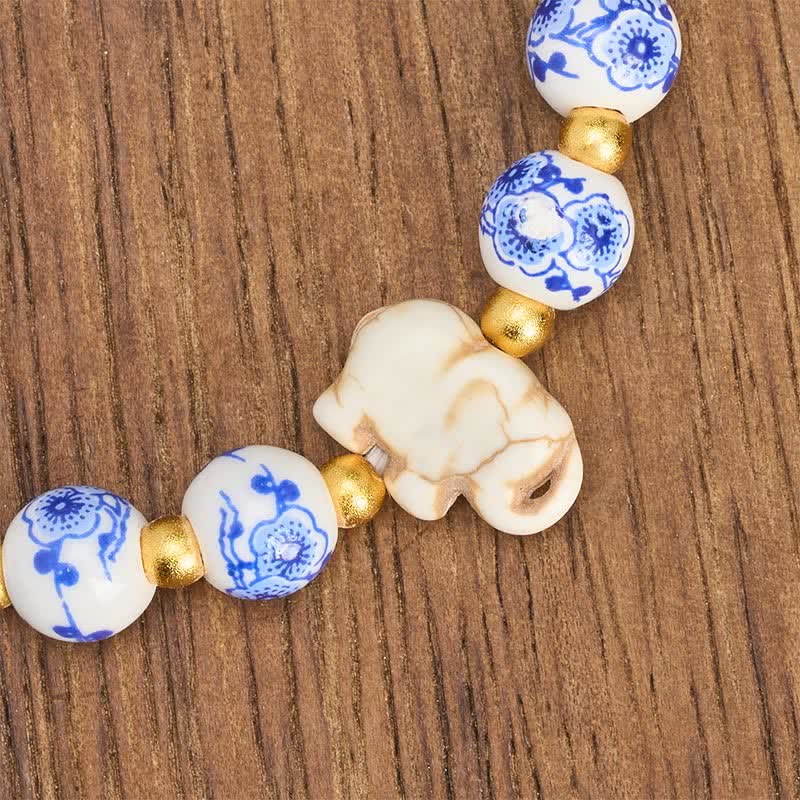 Buddha Stones Pulsera redonda de cuentas florales con forma de elefante de porcelana blanca - image 8